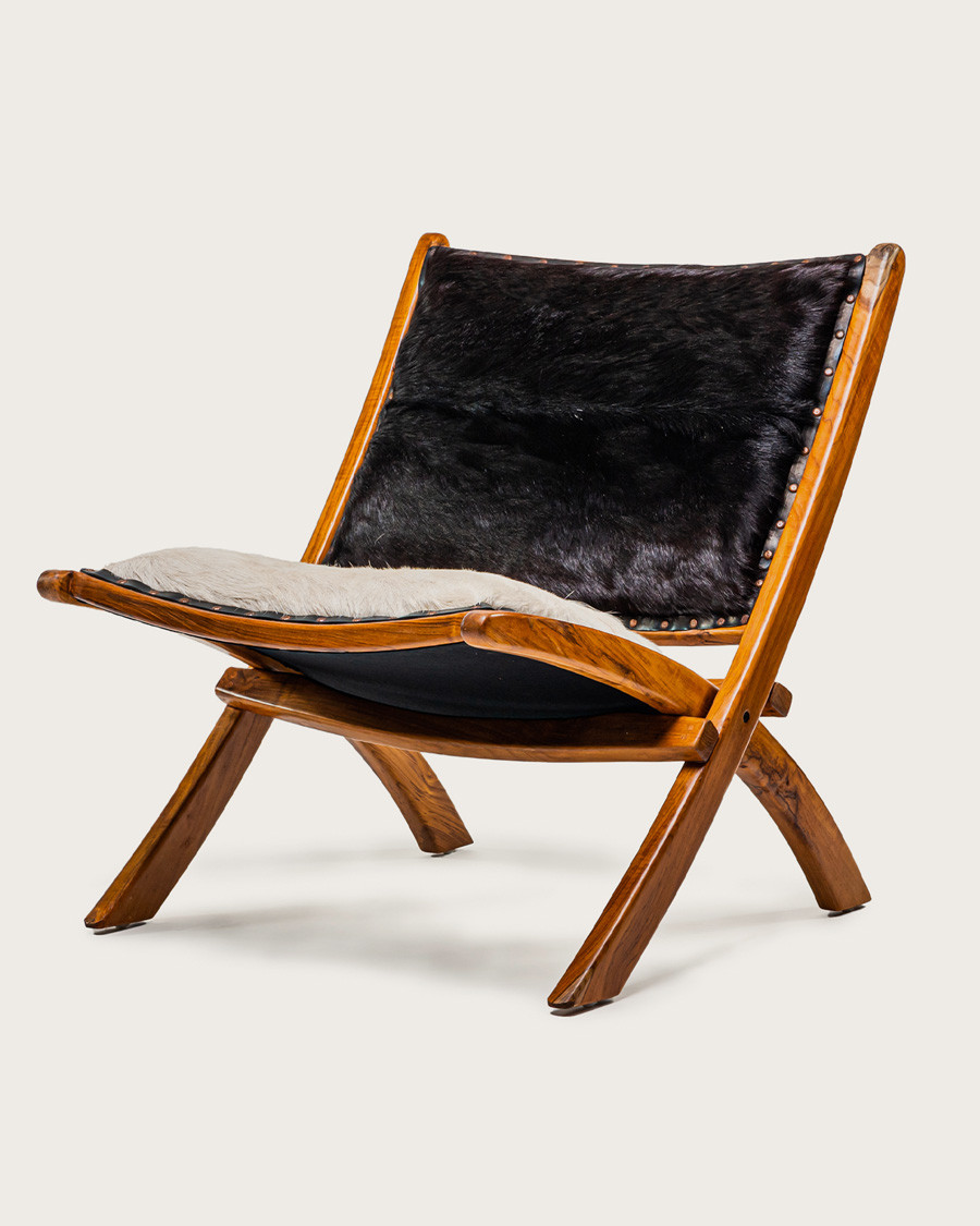 Leela - Armchair in solid teak and goatskin