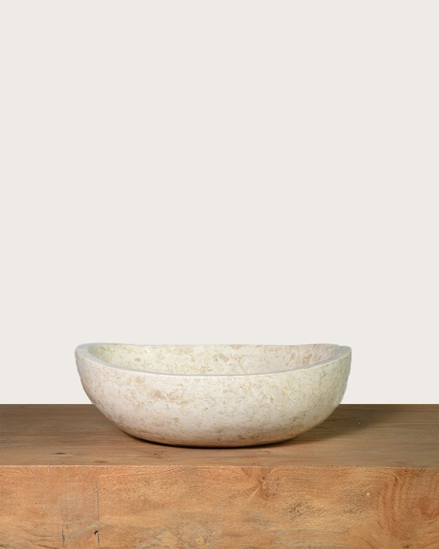Doram - Ovale wastafel van beige marmer