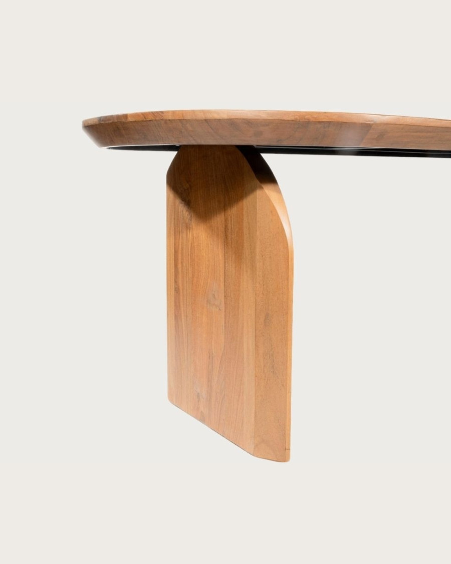 Vega - Tavolo da pranzo ovale in legno di acacia, base dal design curvo e stile minimalista.