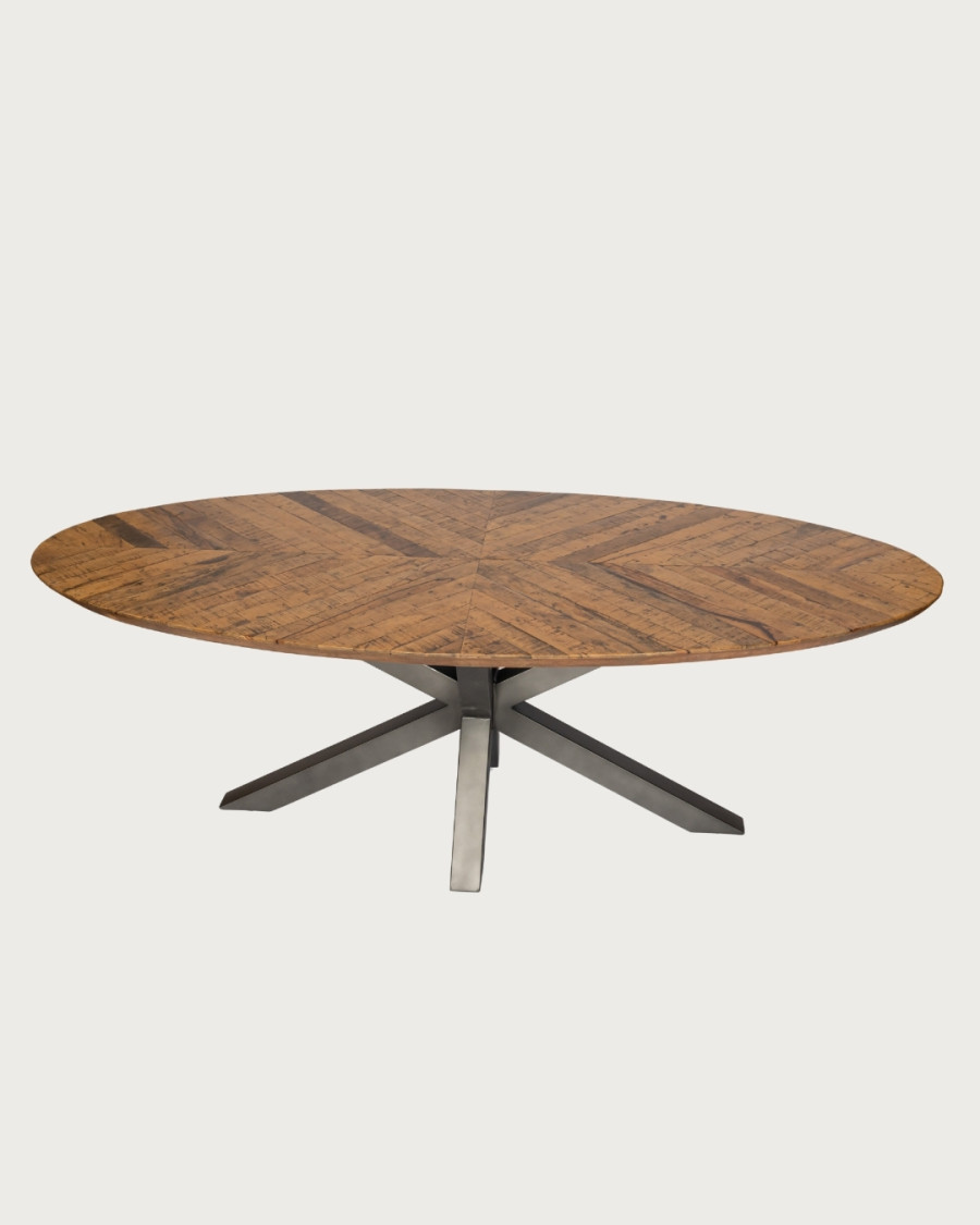 Apogee - Tavolo da pranzo ovale con piano in legno di mango a spina di pesce e base a stella in metallo.