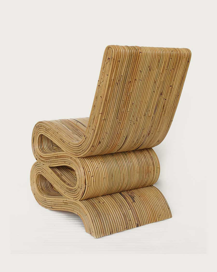 Diu - Designer armchair in woven rattan